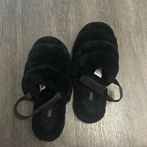 Fluffy black UGG slippers